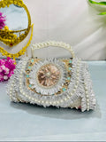 Noor silver-tone clutch with a central medallion, pearl-style handle and layered gota detailing