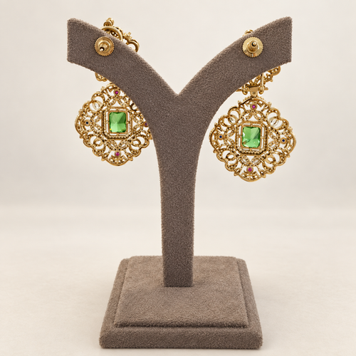 Reverse view of emerald-green statement earrings with real doublet stones